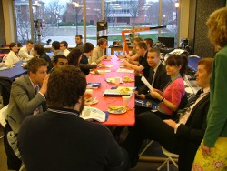 Photo - Two groups of people having lunch