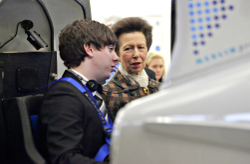 Poster - HRH The Princess Royal shown Coventry's flight simulator suite